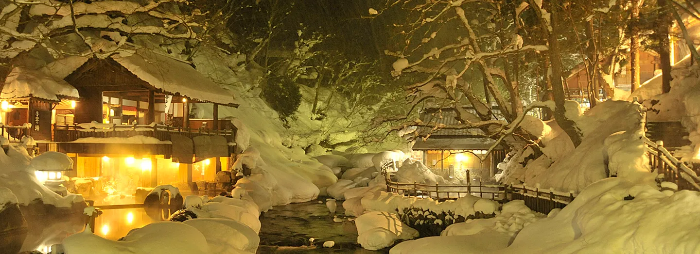 Gunma Prefecture: Takaragawa Onsen Osenkaku amid a snowy landscape